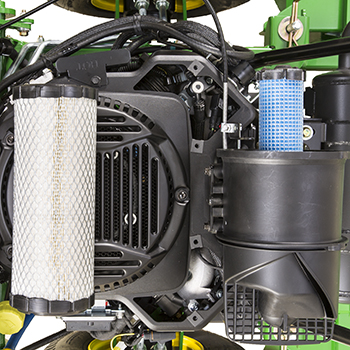 Engine cleanout port covers and air filter removed