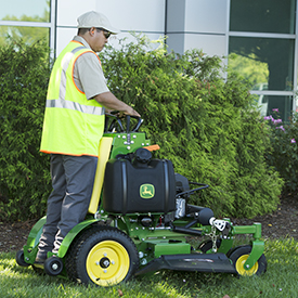 Operator trimming with 636M QuikTrak™ Mower